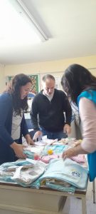 (video)“Infancias felices”: familias de Santa Teresita recibieron ropa y ajuares